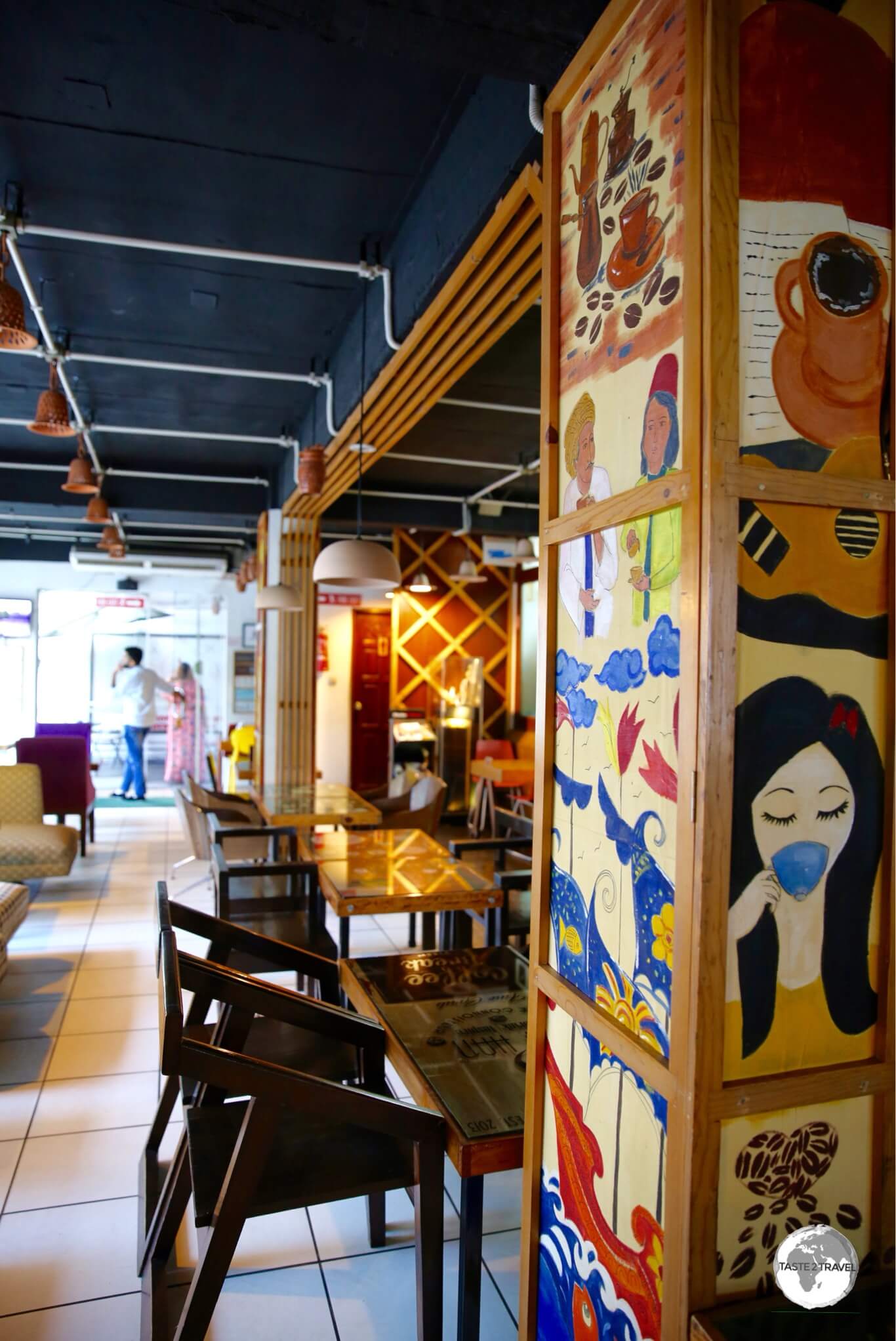 Artwork on the walls of the trendy Kiva Han Cafe, which is located in the upscale Gulshan district. 