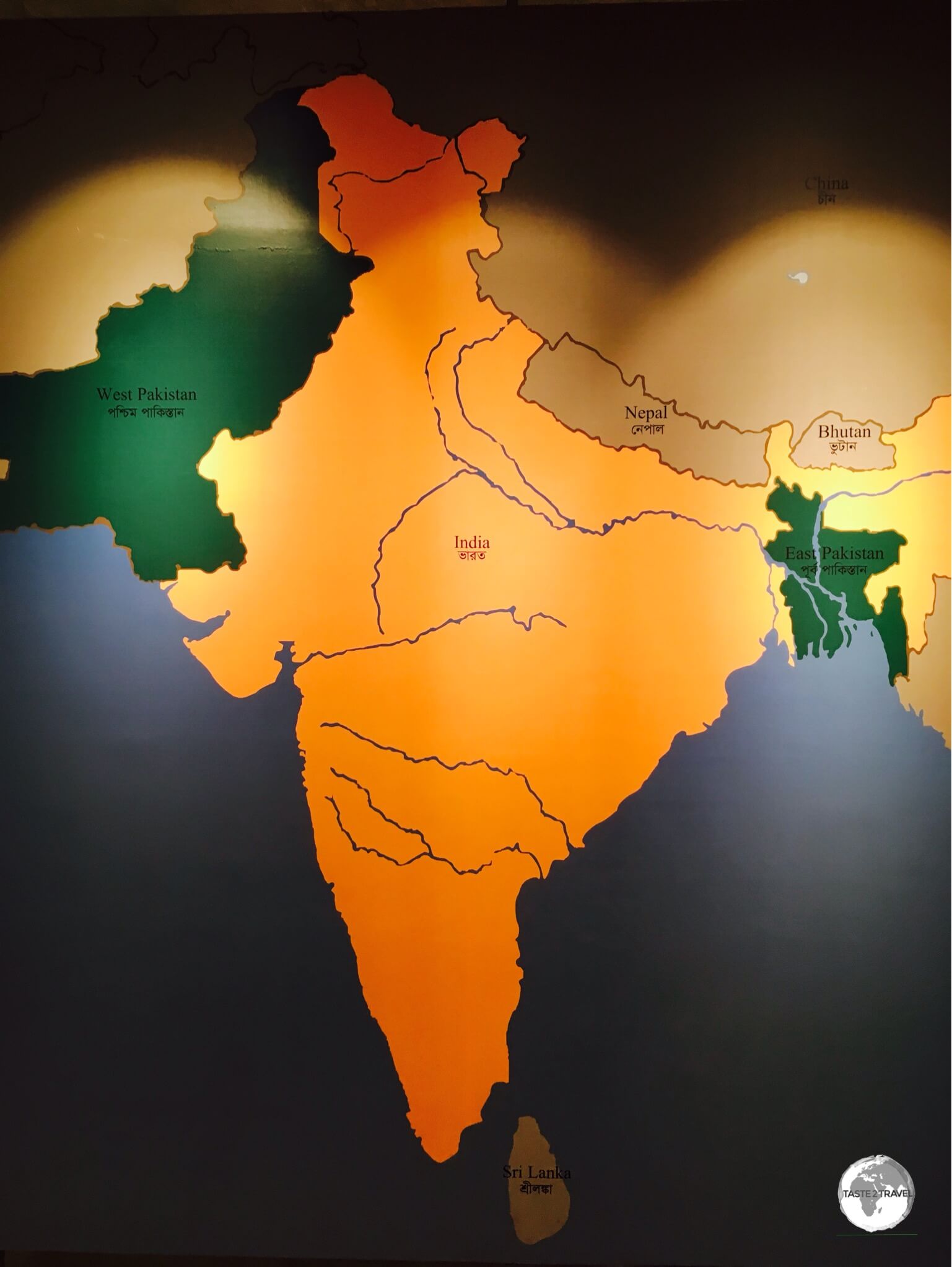 A map at the Liberation War Museum shows the position of Bangladesh (shaded green) to the east of India. 