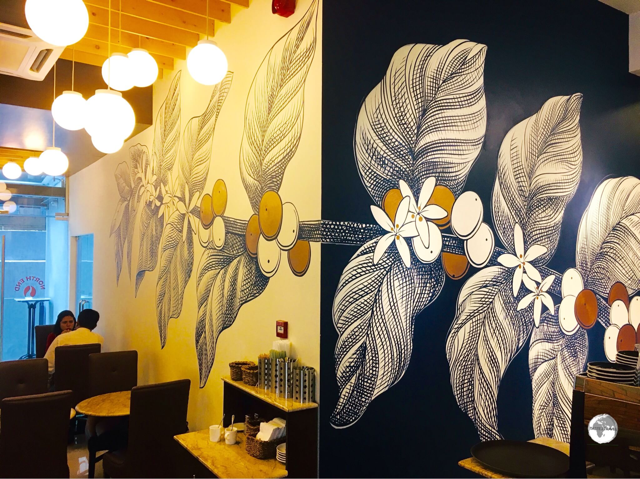 Artwork on the walls of the Banani branch of North End Coffee Roasters.