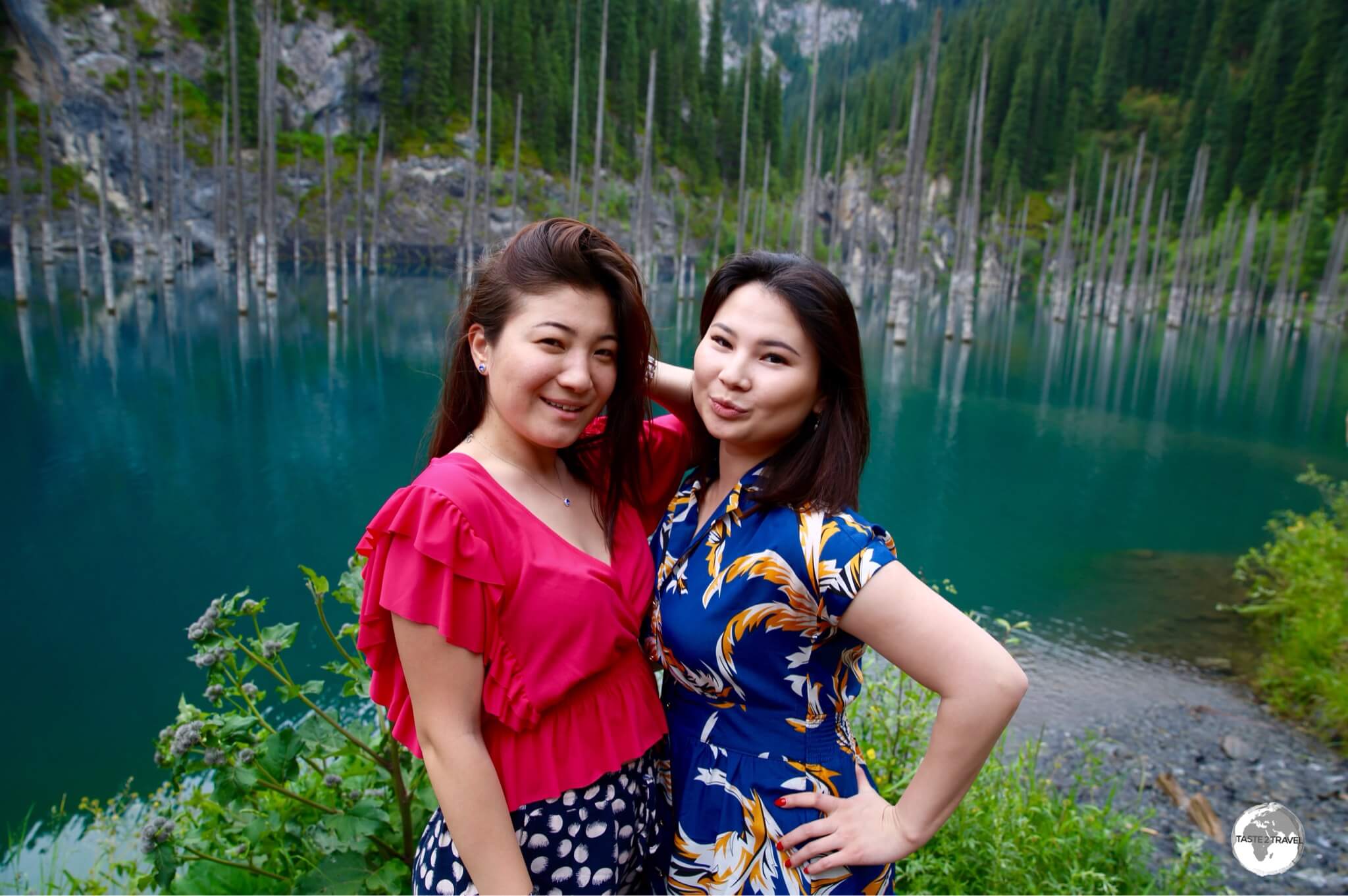 Kazakh girls posing at Lake Kaindy.