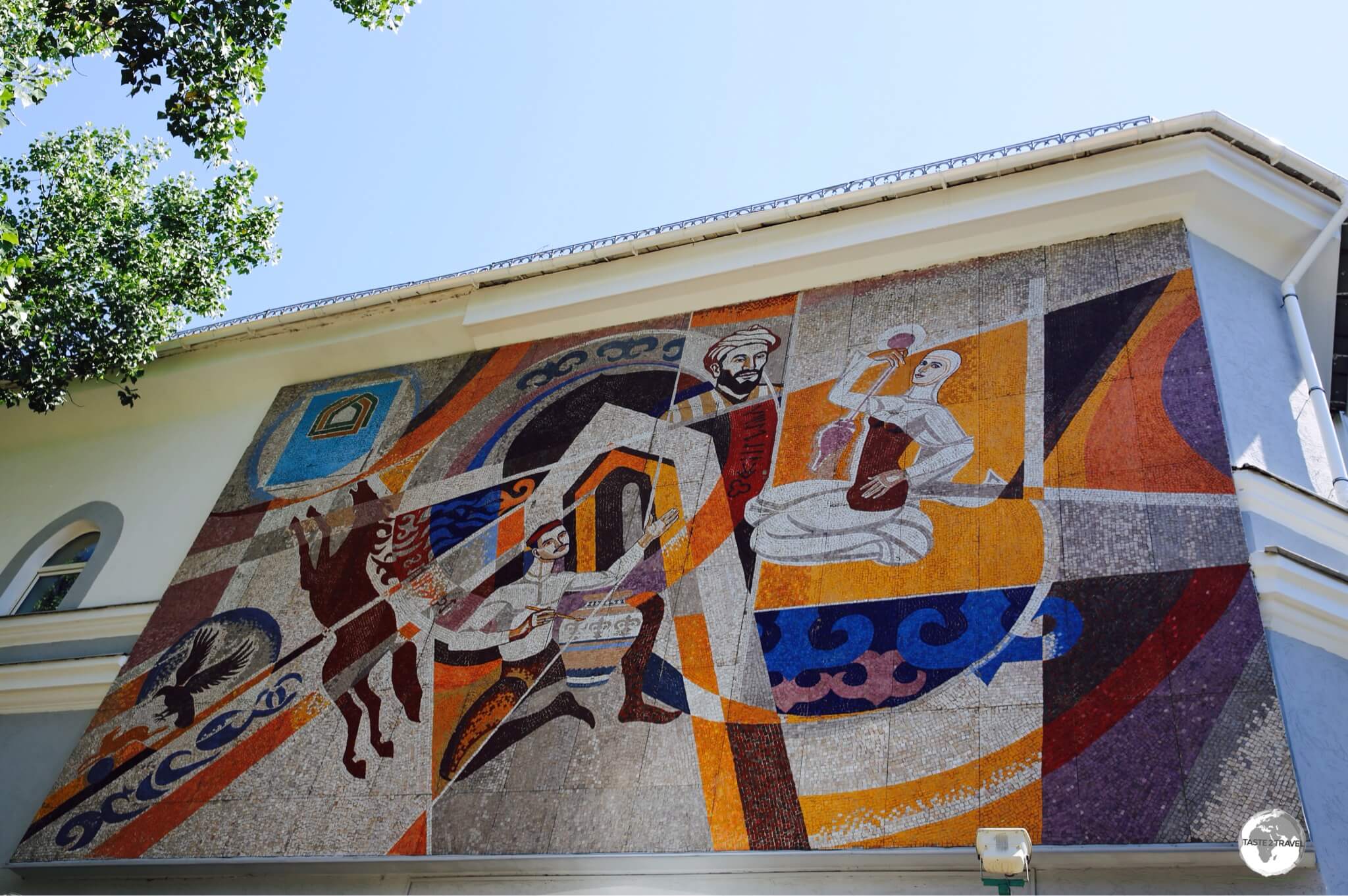 A mosaic dedicated to the 'The Hunt' adorns the wall of the KIMEP University Great Hall on Abai avenue. 