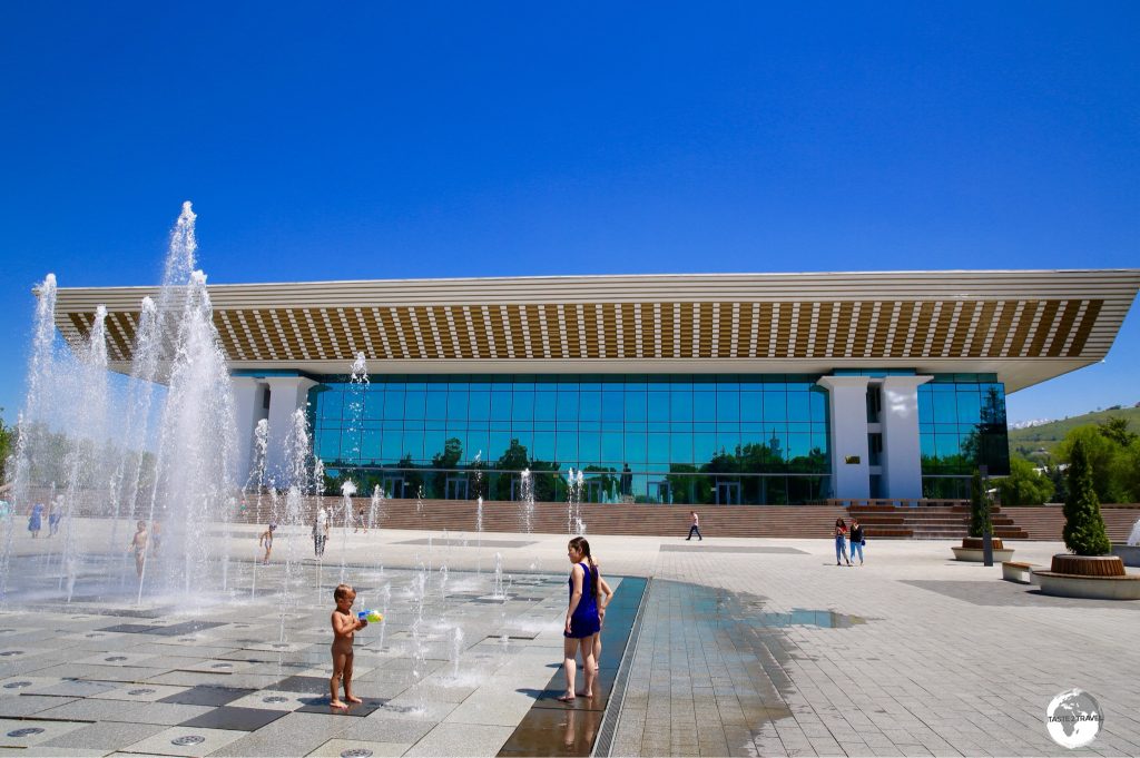 Fountains outside the Palace of the Republic provide cooling relief on a hot summer day.