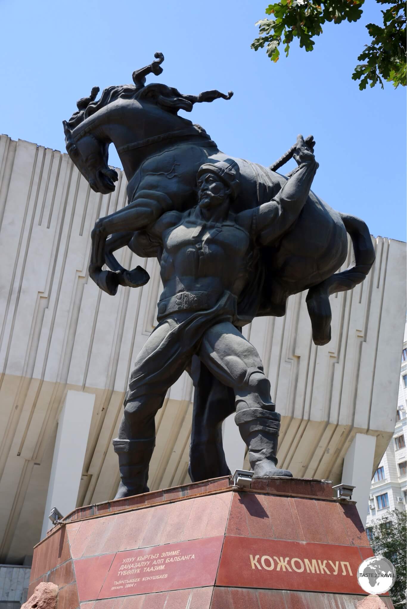 The statue of the strongman, <i>Kozhomkul</i>, which stands outside the Sports Palace in downtown Bishkek.