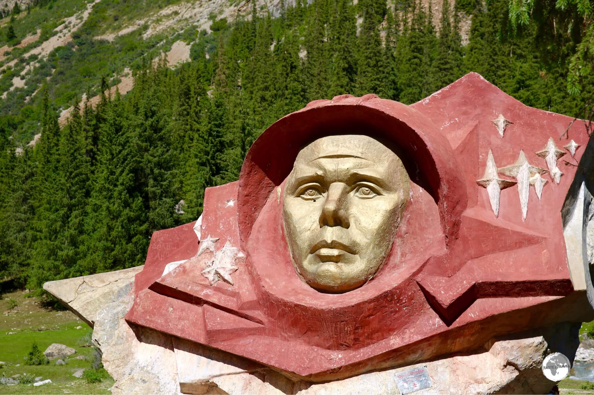 The face of the famous Russian cosmonaut, <i>Yuri Gagarin</i>, is carved into a boulder in the Barskoon valley.