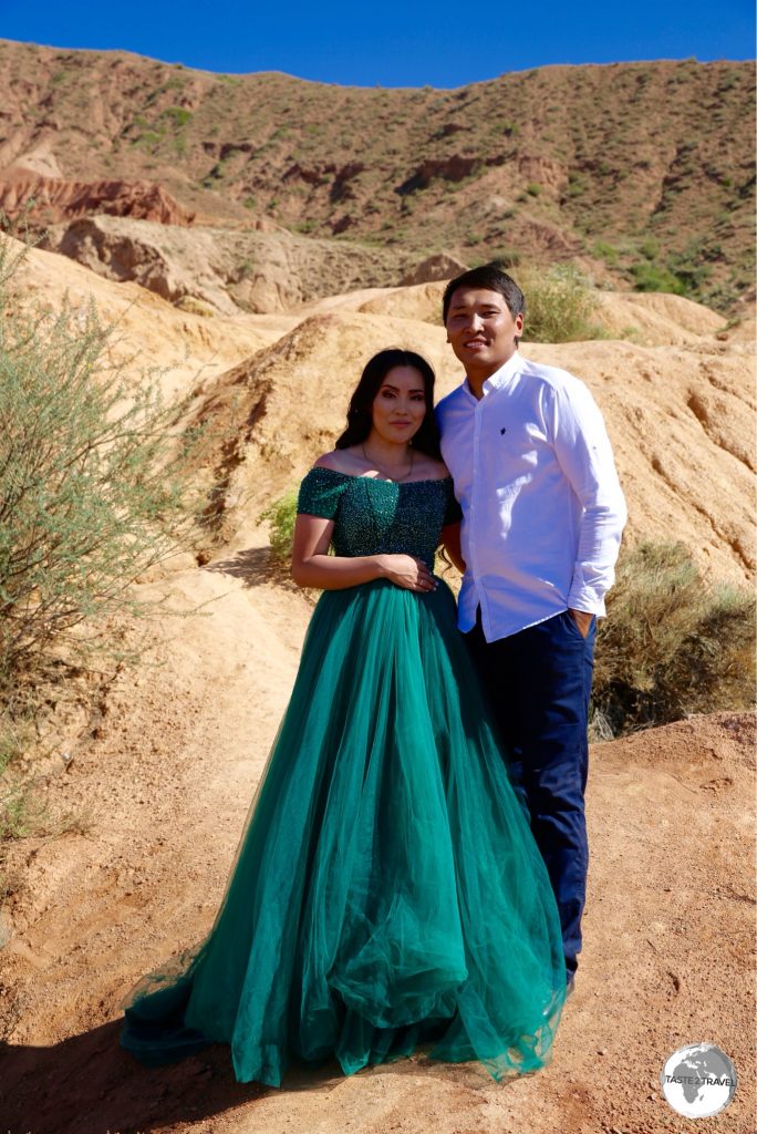 Living the fairy-tale! A Kyrgyz couple posing for the camera at the Fairy-tale canyon.