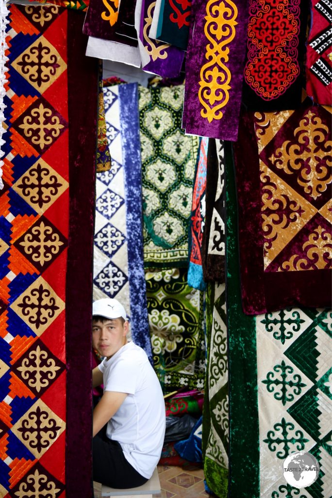 A shop-keeper at the Jayma bazaar.