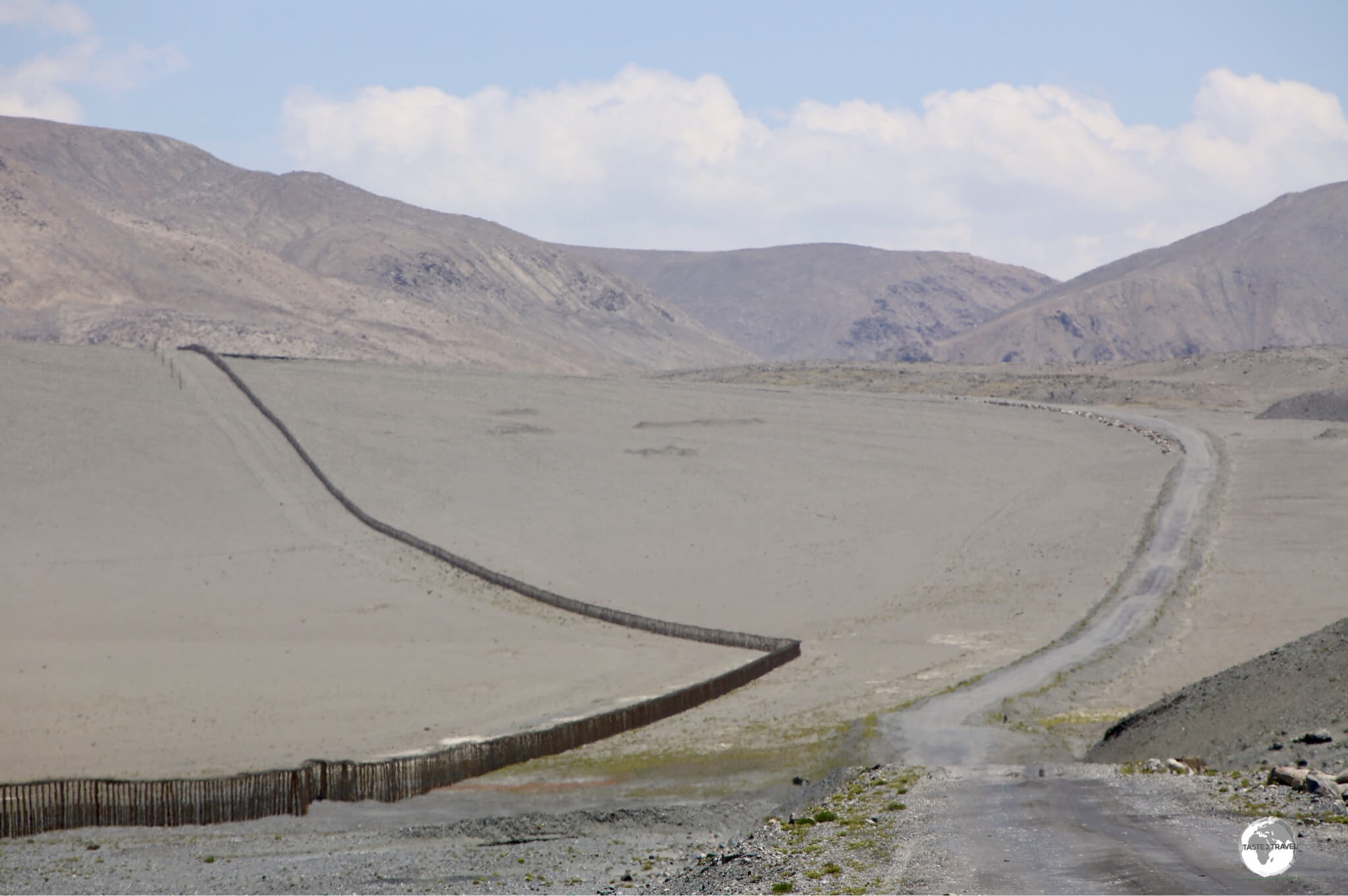 The Pamir highway travels alongside a continuous barbed-wire fence which was built by the Chinese as a border fortification.