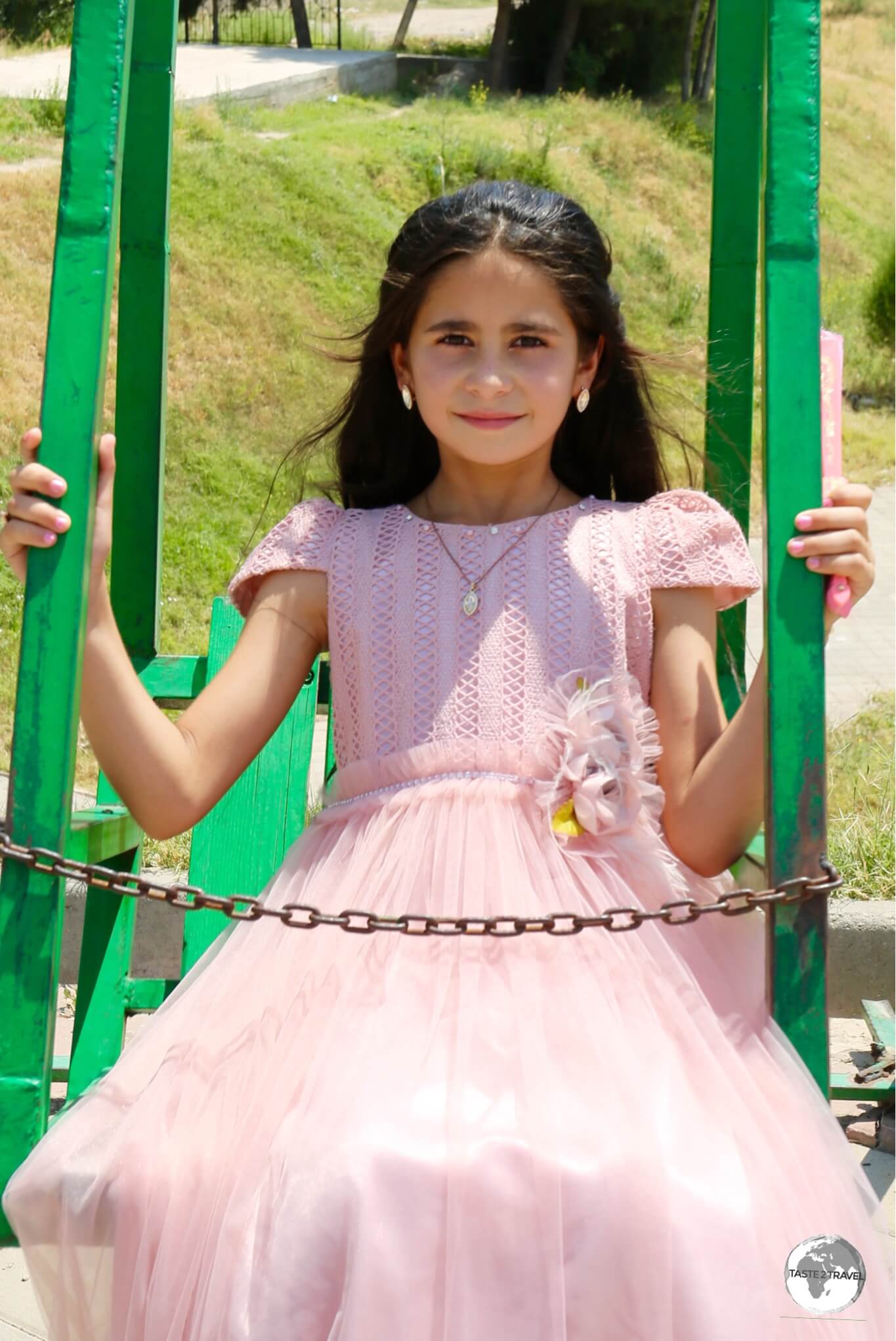 A young Tajik girl, enjoying a day out at Hissar fort near Dushanbe.