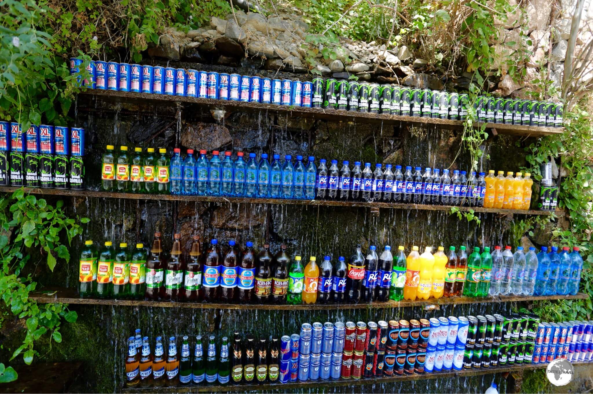 A novel concept for an outdoor drinks shop - drinks are kept cool under the flow of a trickling waterfall.