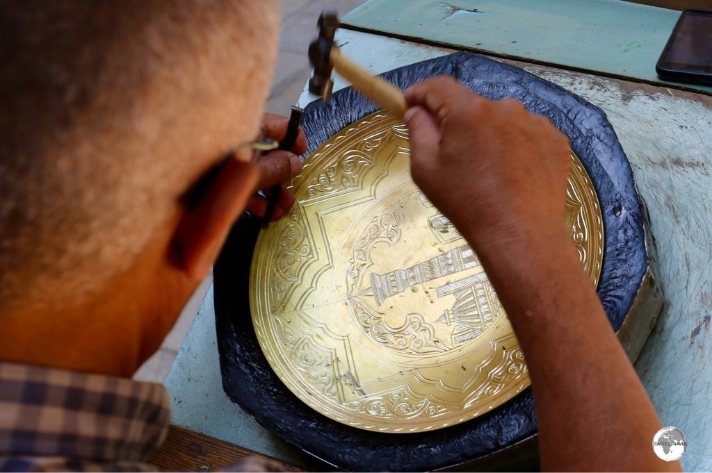 A metal worker in Bukhara.