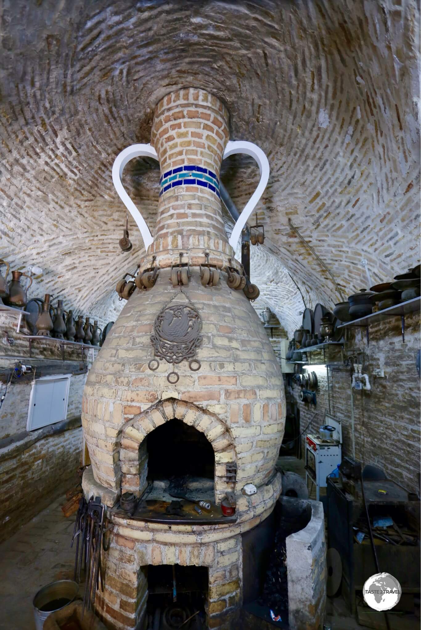 A traditional blacksmith workshop at the Chasing Metal Museum in Bukhara old town.