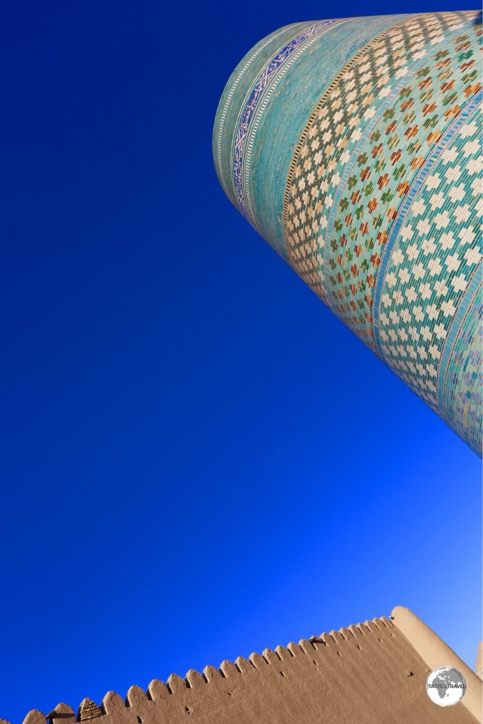 The old town of Khiva is full of blue-tiled mosques and minarets, all of which contrast nicely with the earth-coloured mud walls.