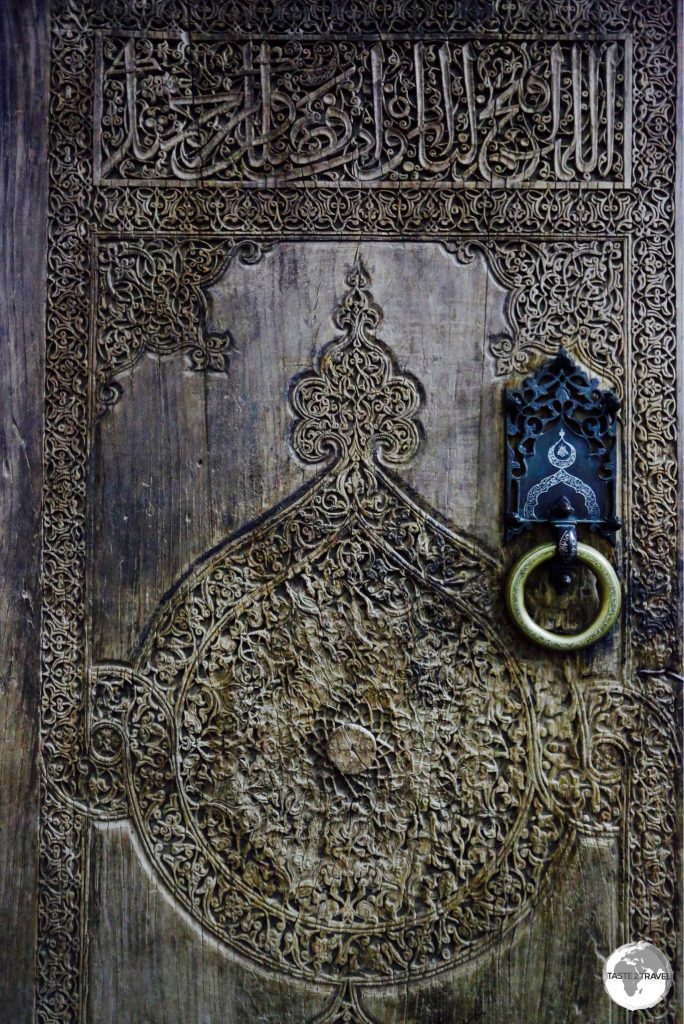 A wooden door at the Tosh Hawli palace in Khiva.