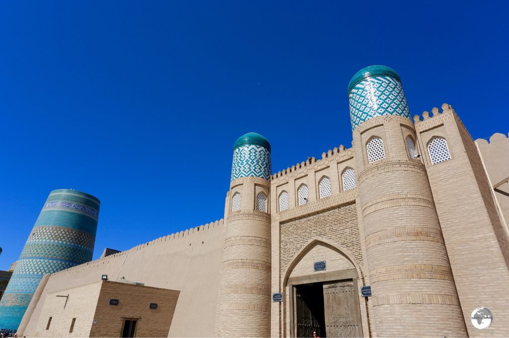 The entrance to the Kunya Ark citadel with the small jail house museum to the left.