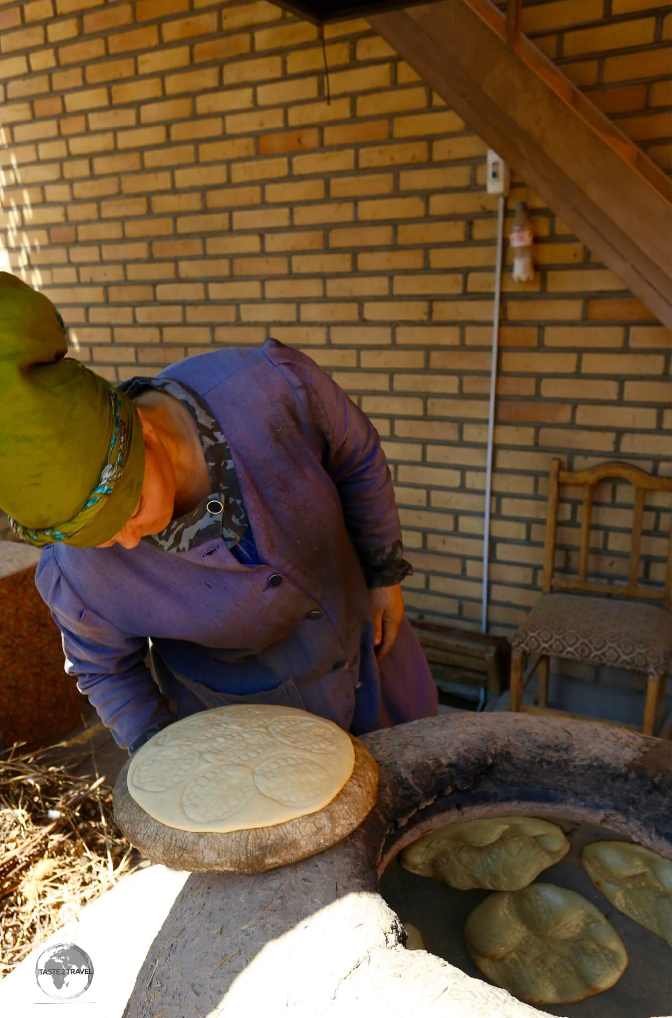 Bread in Khiva being baked in a clay oven. 