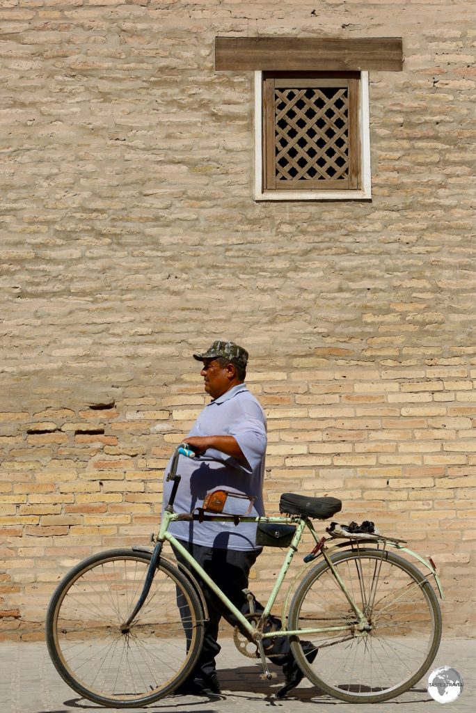 An Uzbek walking through Khiva old town.