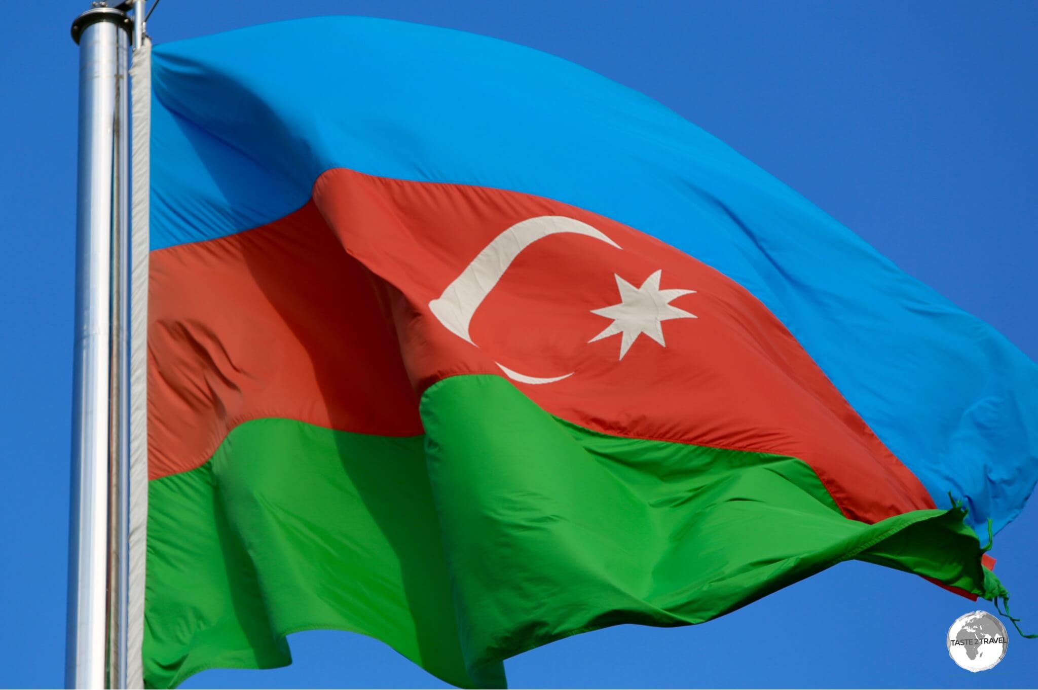 A gigantic Azerbaijan flag flying in downtown Baku. 