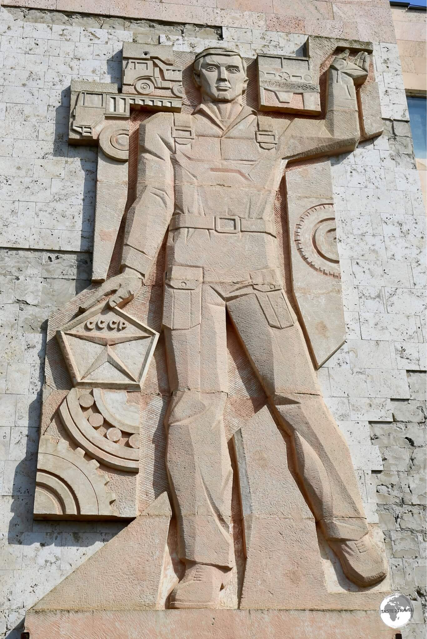 An incredible 'CCCP Worker' stone mosaic on the wall of a factory in a quiet backstreet in Bender.