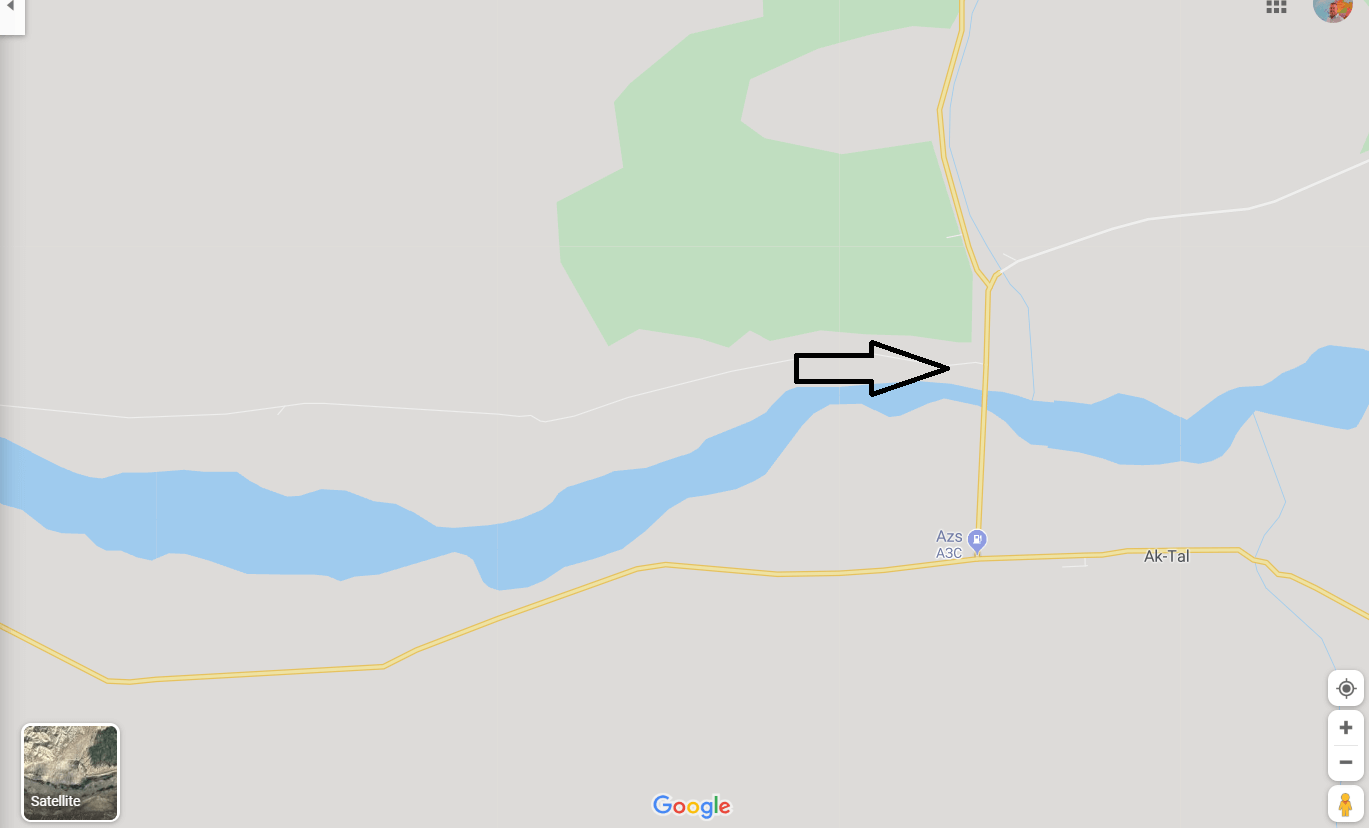 The current highway to Kazarman (indicated by arrow) is an unmarked gravel road.