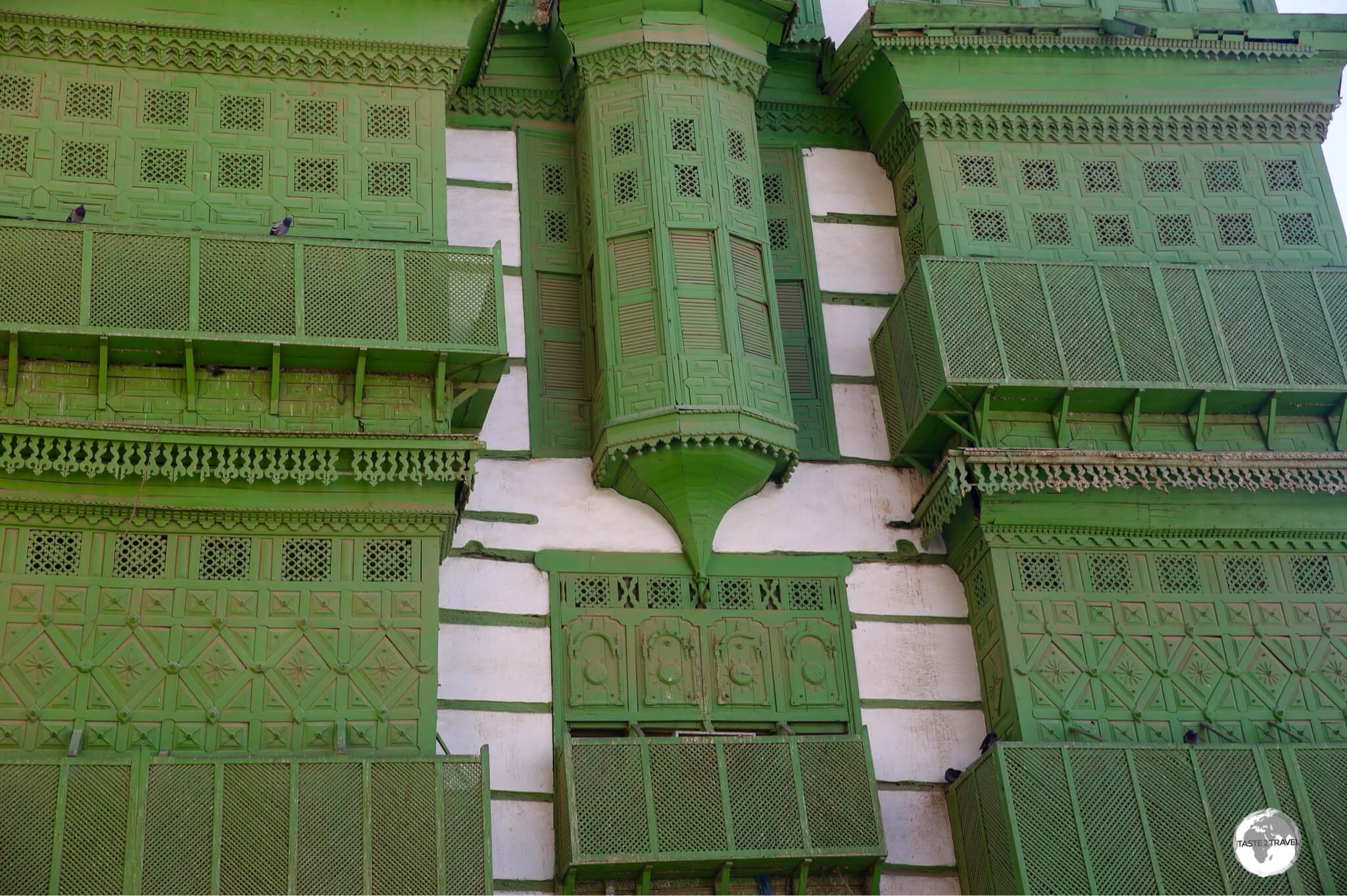 A fine example of 'Hejazi mashrabiyya', wooden lattice work, on a home in Al Balad. 