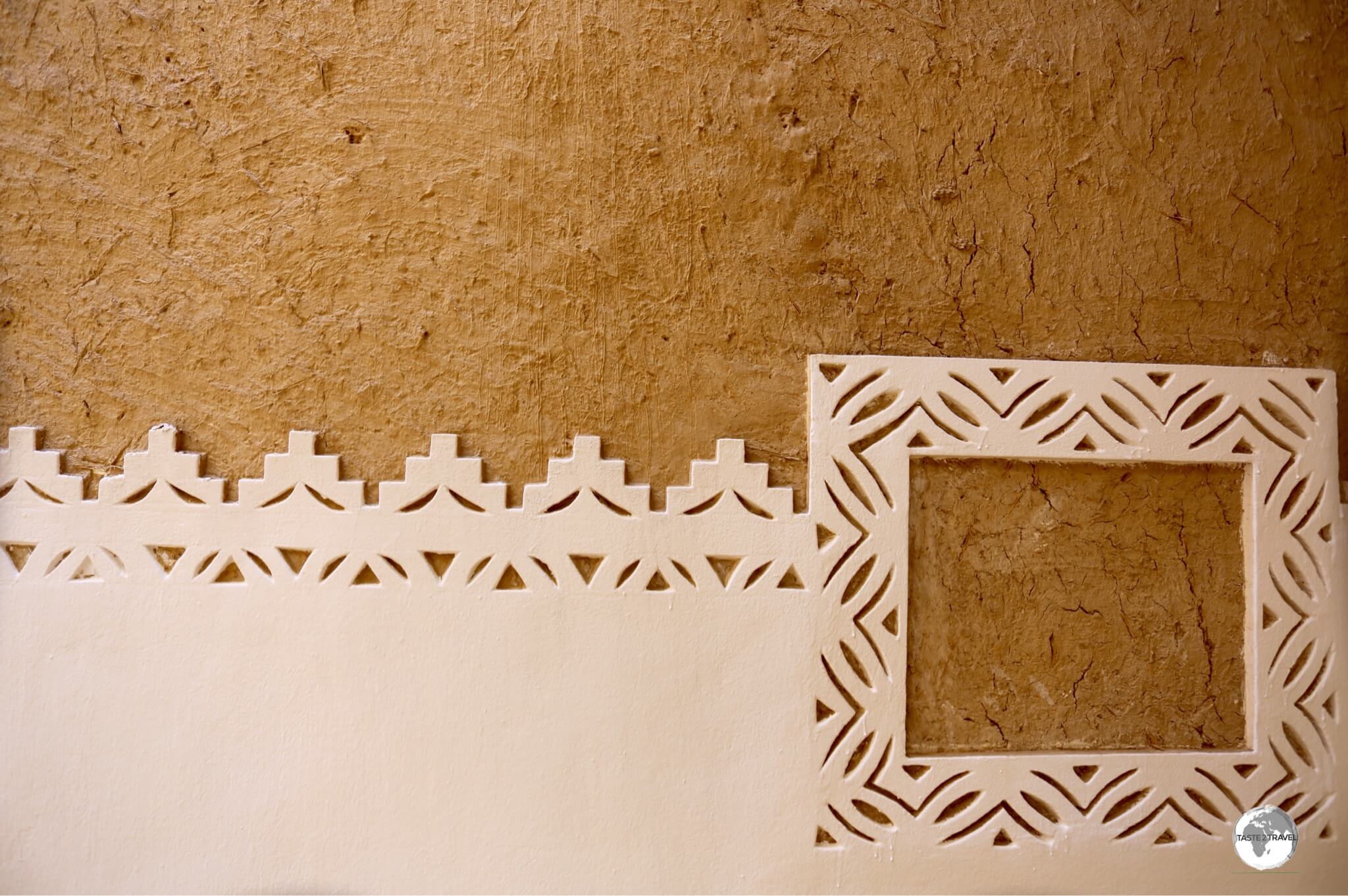 Plaster work on one of the courtyard walls at Al Masmak fortress. 