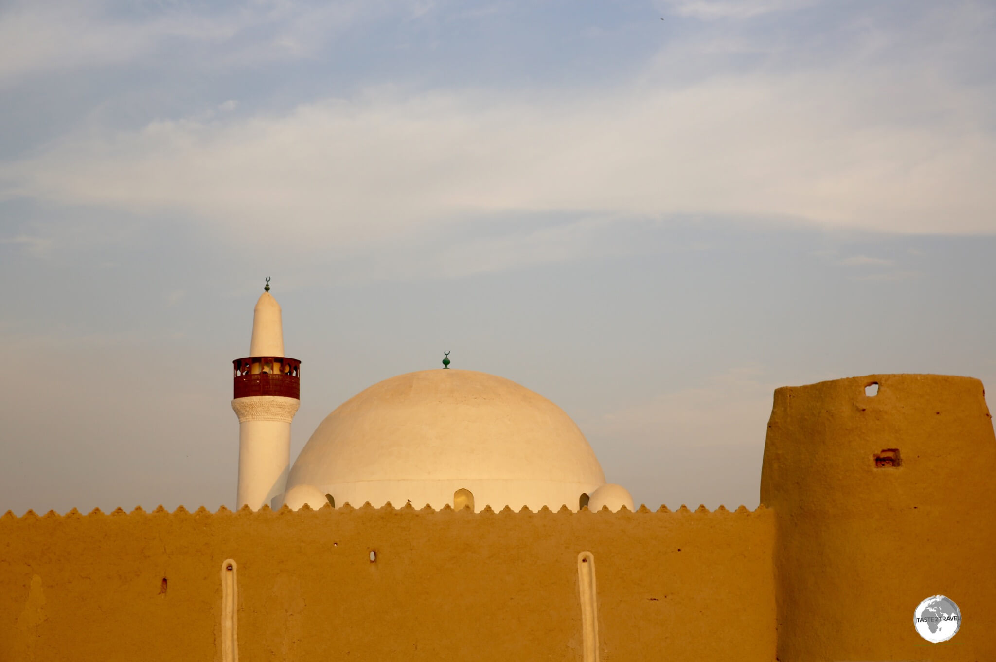 The dome of the Al-Qubba mosque rises above the mud walls of the Ibrahim Palace compound in Al Hofuf.