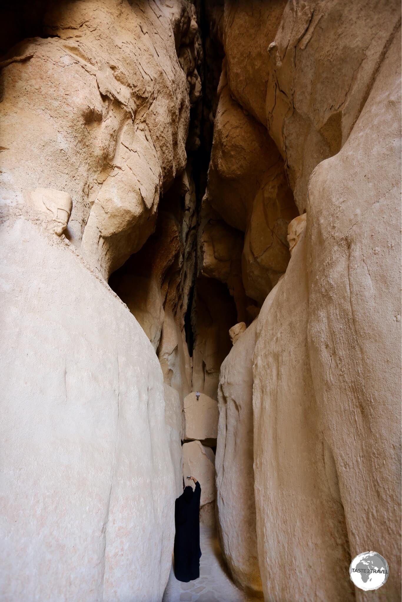 A Saudi tourist inside one of the cavities of Al Qarah Mountain in Al Hofuf.