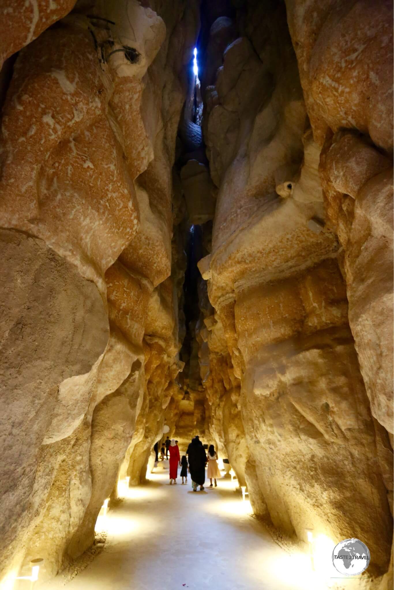 The main cavern in the Al Qarah Mountain complex has been paved and is lit with artificial lighting.