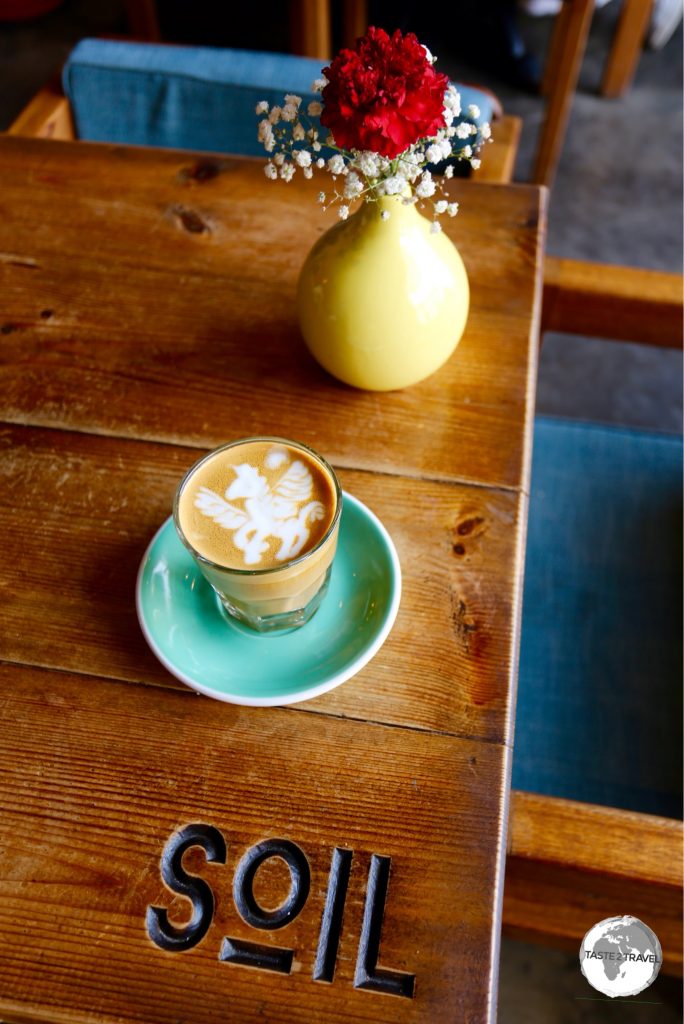 Unicorn café latte artwork at Soil Coffee Roasters in Dammam.