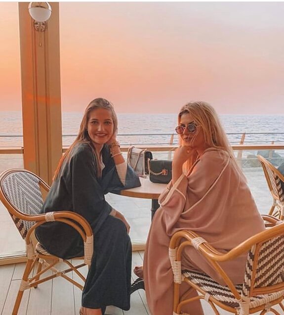 Majda and friend, two European expats, setting a stylish tone in their Abeya's while watching the sunset over the Red sea from a cafe in Jeddah. Almost all female expats wear the Abeya. Source: Majda Korjenic