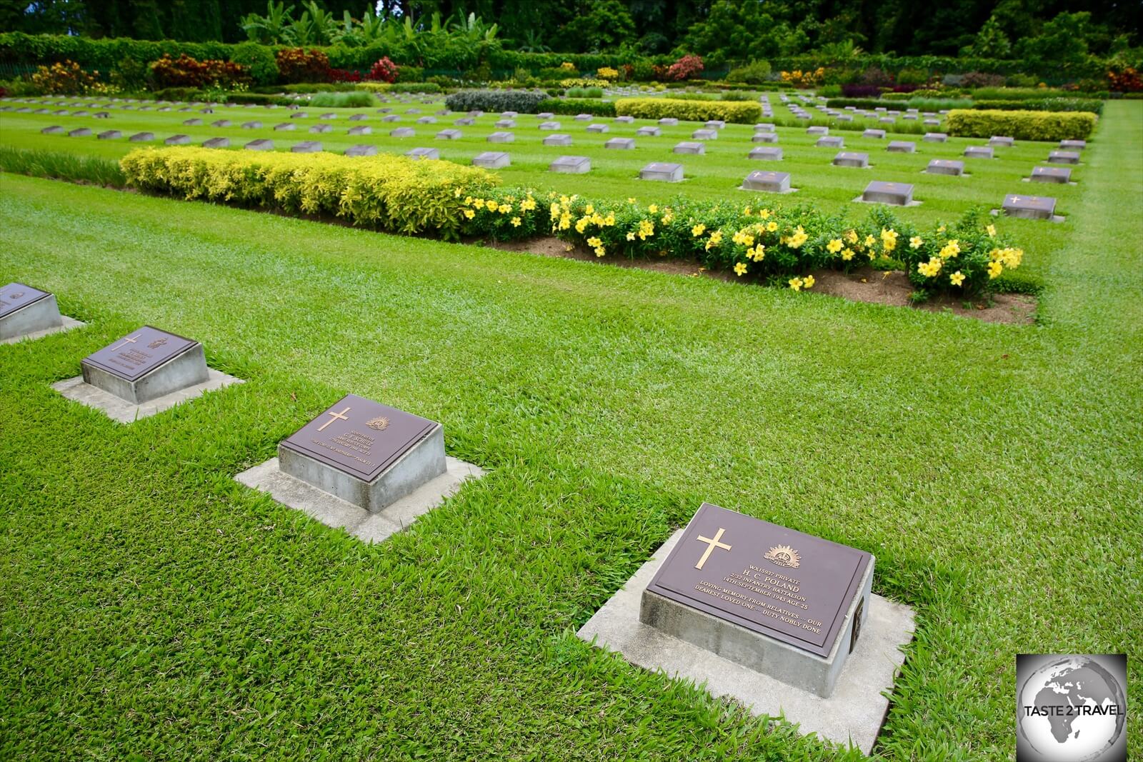 Grave markers for Australian soldiers who died during the many battles which occurred around Lae during WWII. 