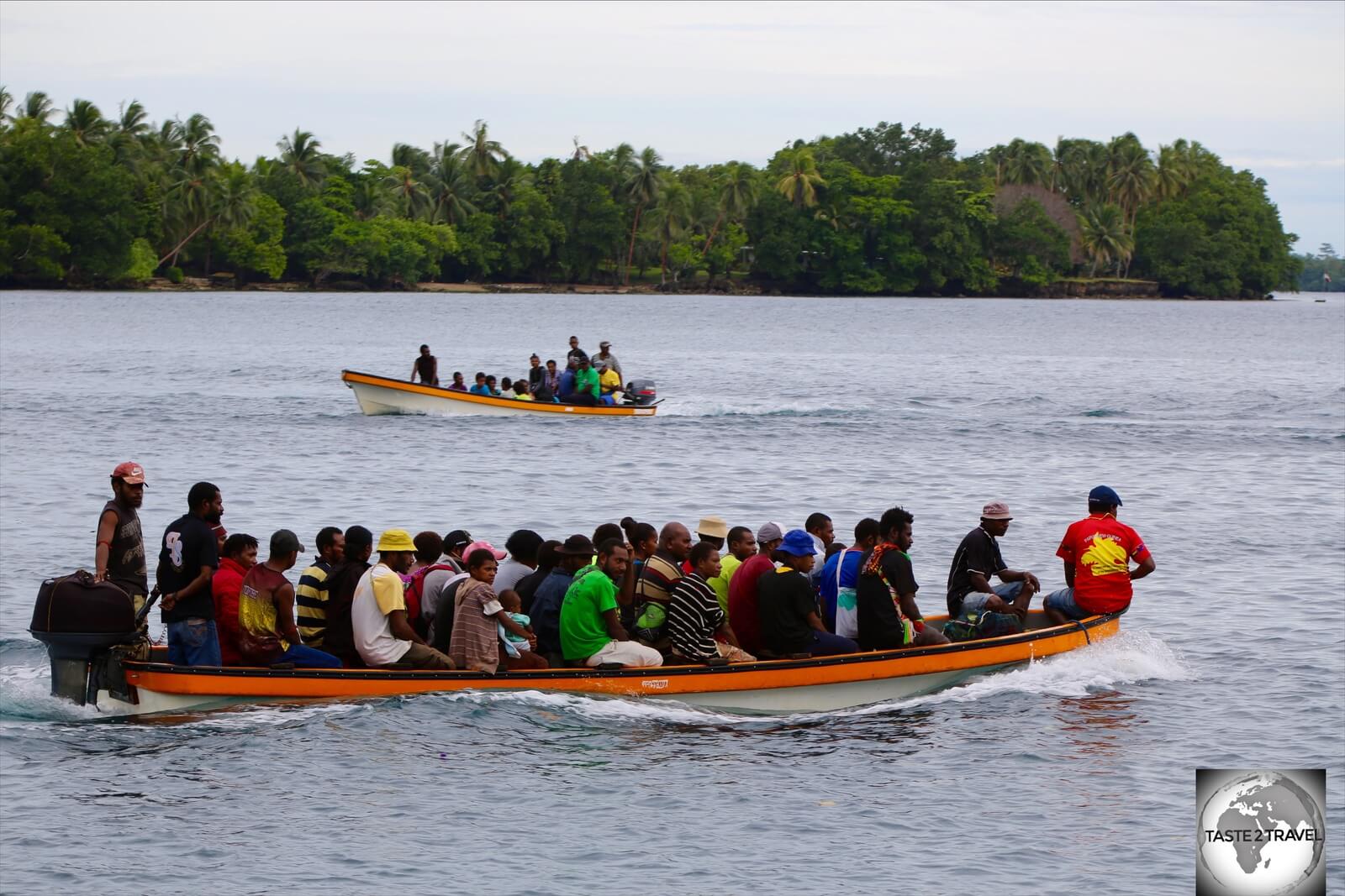 A very full Banana boat, transporting villagers from Madang back to their villages.