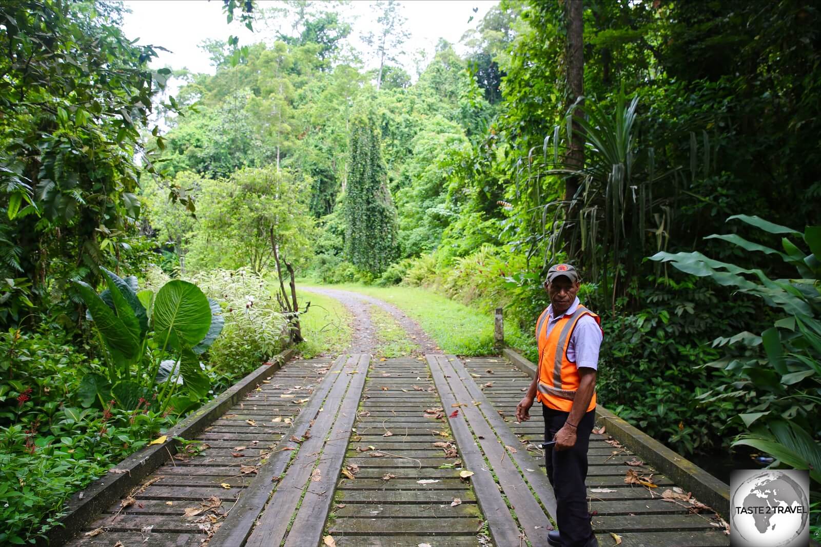 The friendly security guard at Lae Botanical Garden, who - for my own safety - wouldn't allow me to proceed beyond this bridge.