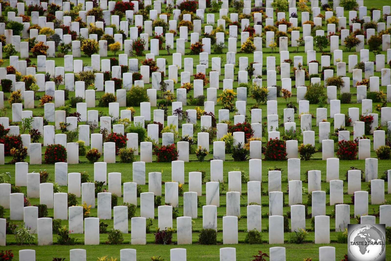 Rows of marble gravestones at the Bomana War Cemetery in Port Moresby. 