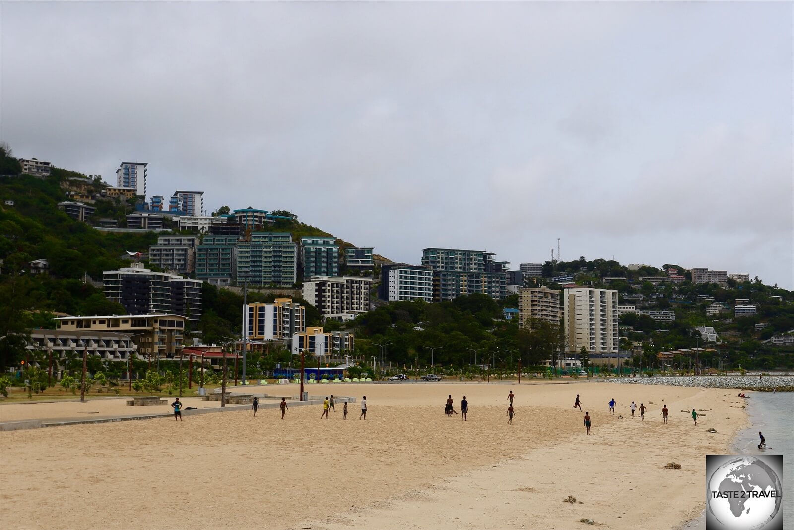 The golden sands of Ela beach are a popular recreation area, where local boys love to play rugby. 