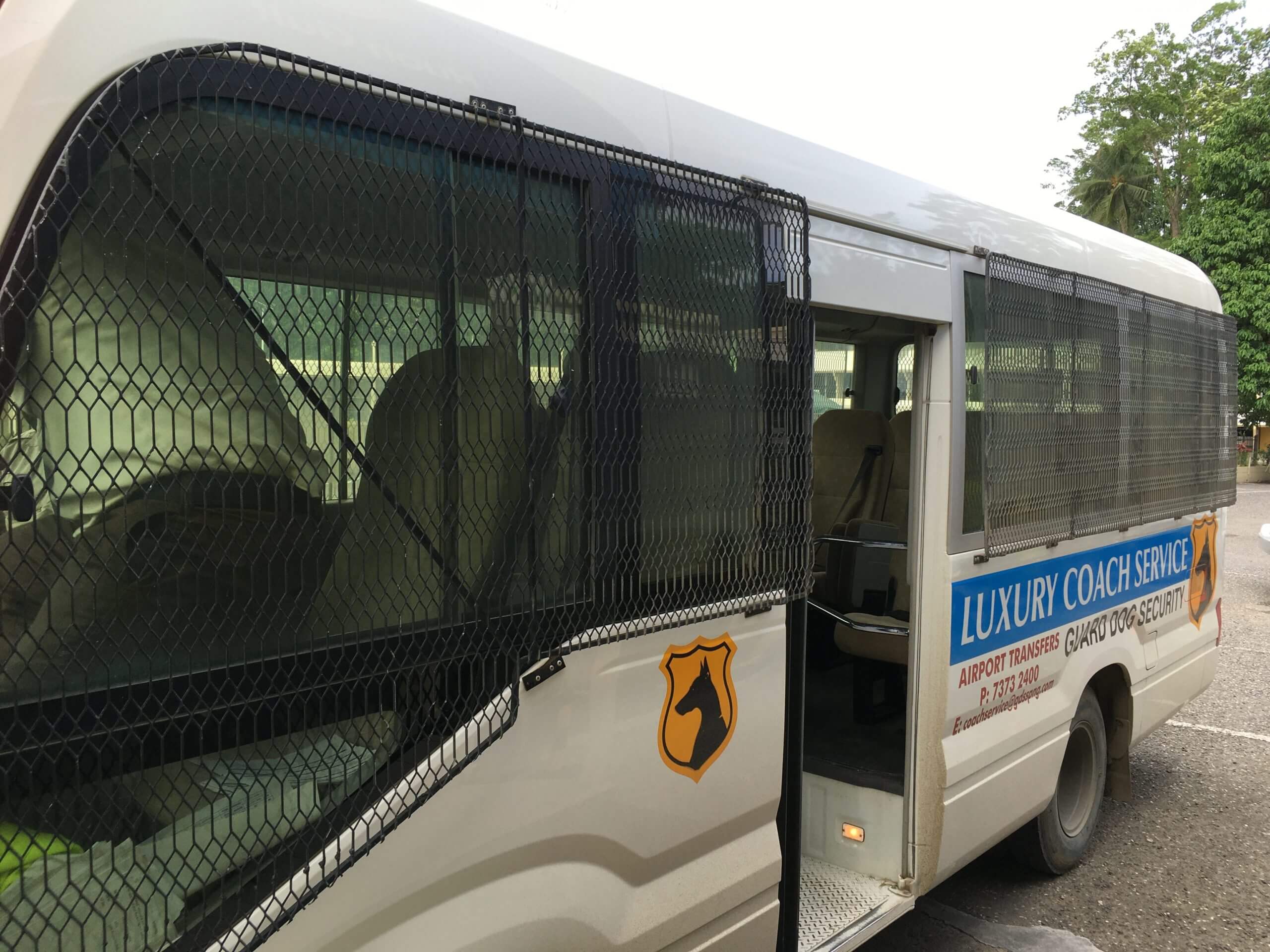 The Guard Dog Security company airport shuttle bus in Lae. 