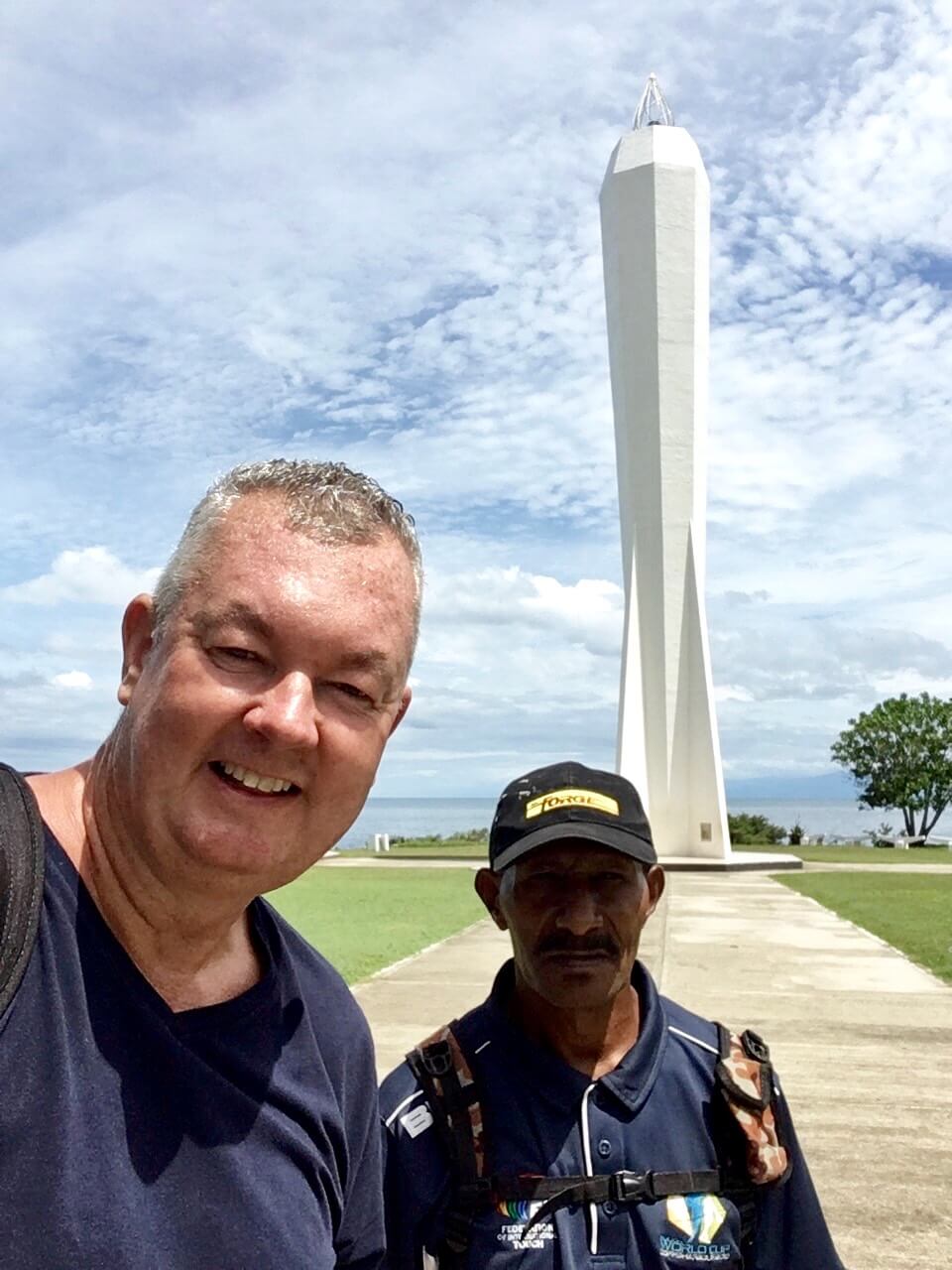 A very hot and sweaty me, exploring the sights of Madang with my security escort - Michael Tom.