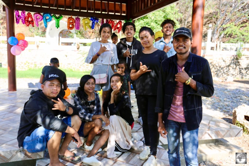 A group of Timorese celebrating a birthday at Cristo Rei.