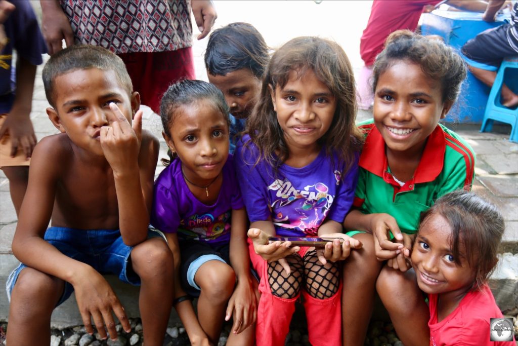 Children playing in the Tais market in Dili.