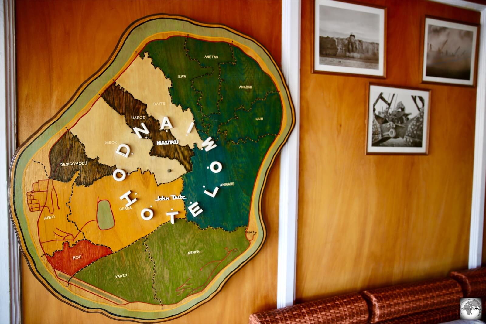 A wooden map of Nauru, showing the different districts, adorns the wall of the OD-N-Aiwo Hotel. 