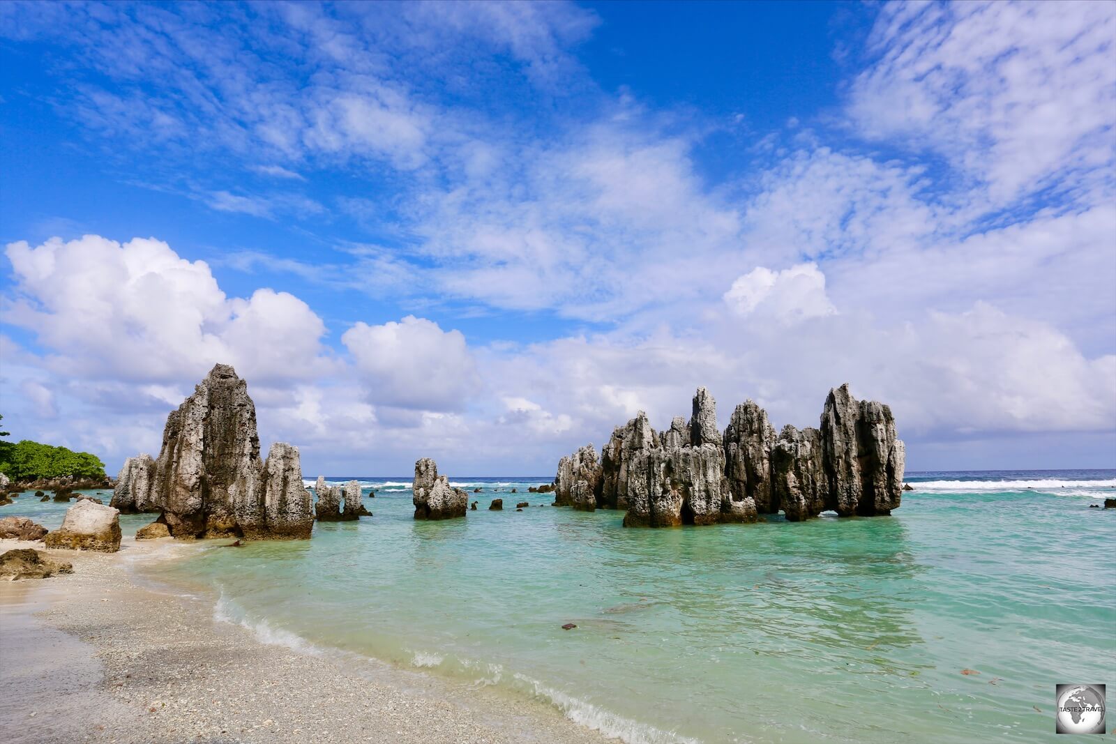 A view worthy to be the cover photo for this guide. Limestone pinnacles, rising from the reef at the northern end of Anibare Bay.