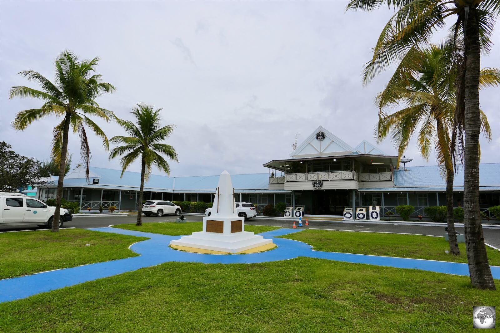 A view of the Ministerial Building with the Nauru War Memorial in the foreground. 