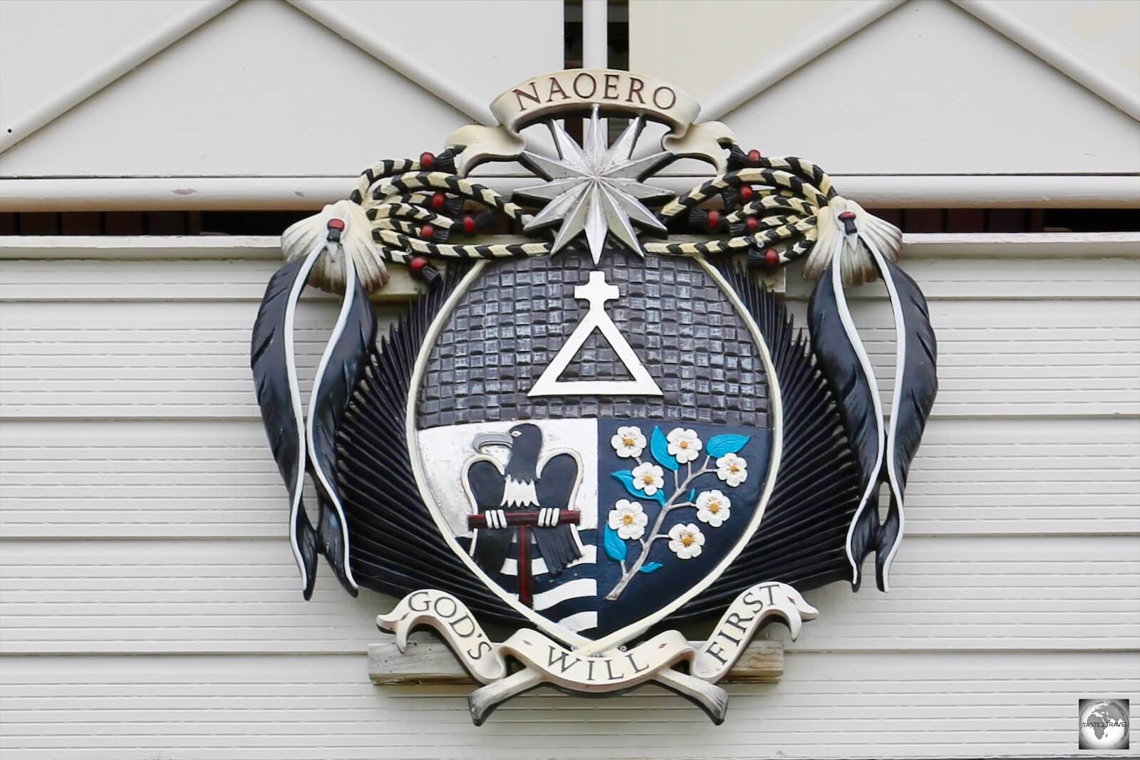 The Nauru coat of arms is displayed above the entrance of the Ministerial Building in Yaren.