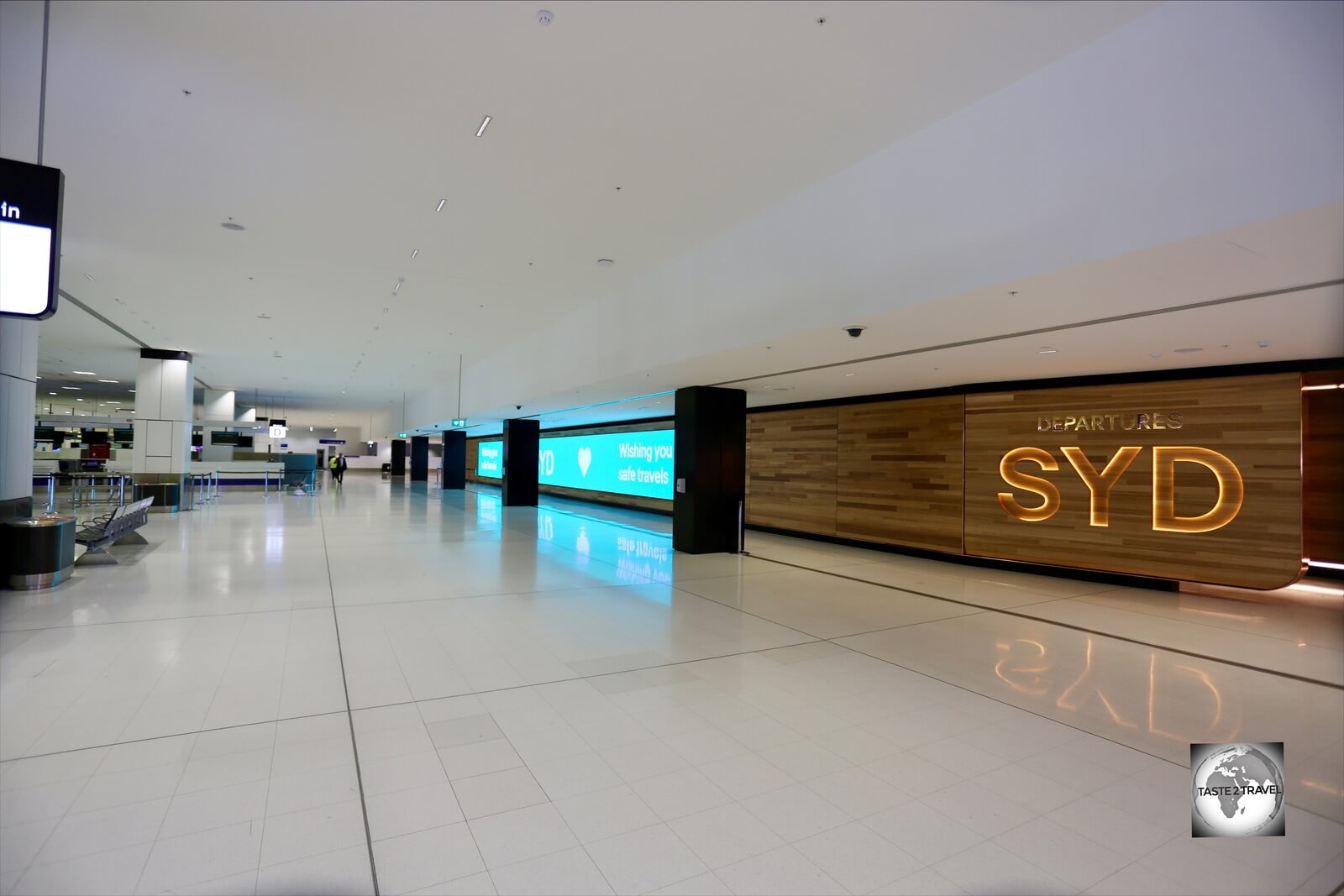 Normally bustling with travellers, a deserted International terminal at Sydney International airport during the Covid-19 pandemic. The flight to Norfolk Island was one of just 12 flights departing that day.