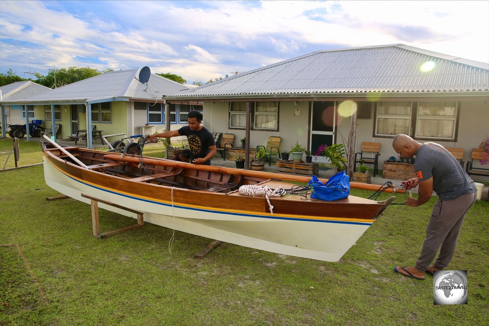 A Jukong sailing team on Home Island, preparing their boat for the big race.