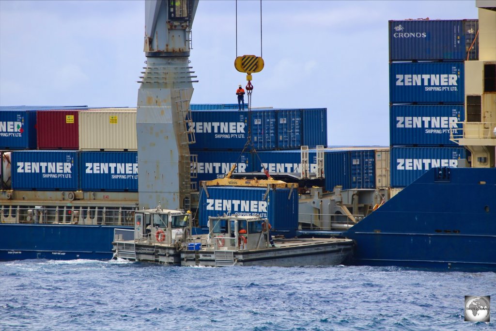 Unloading a container ship in Flying Fish Cove, Christmas Island.