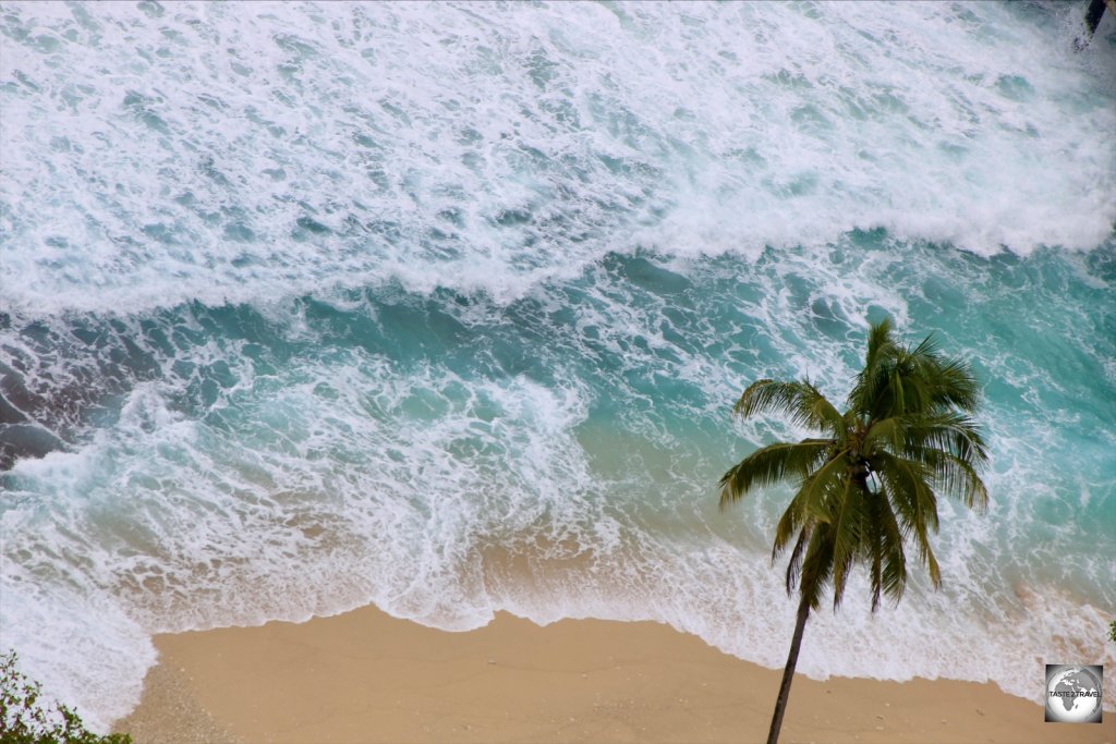 A view of Flying Fish Cove during rough weather.