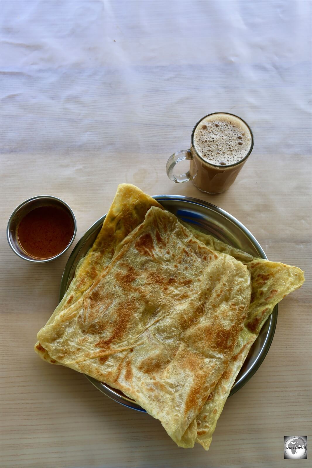 The perfect Malaysian breakfast at Halal café - Teh Tarek and Roti Telur. 