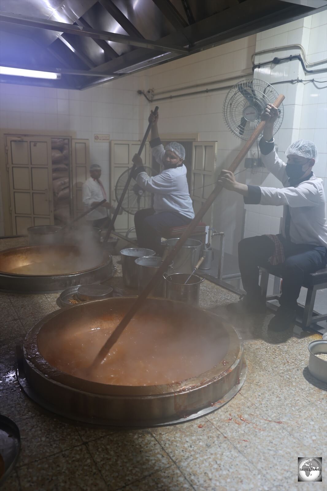 With summer temperatures reaching 50 degrees in Bahrain, constantly stirring heated vats of Halwa is a punishing task.