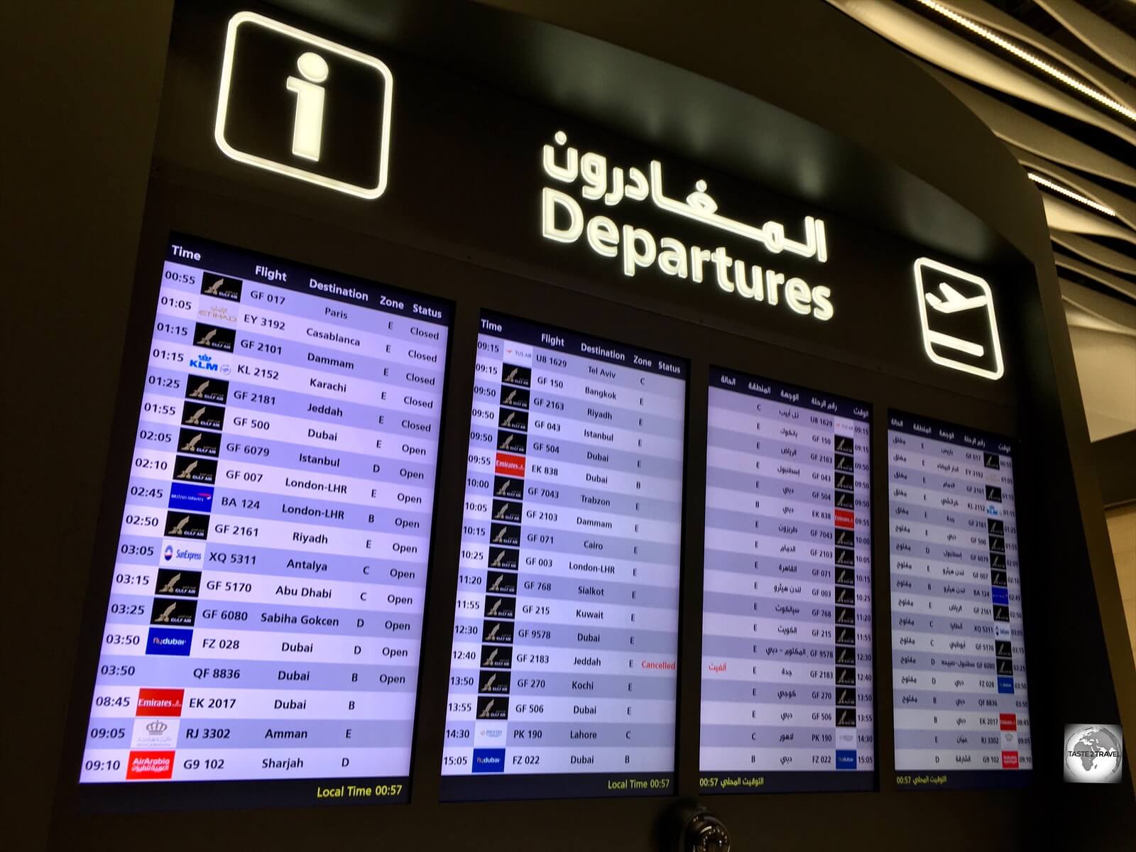 Departure board at Bahrain International Airport. 